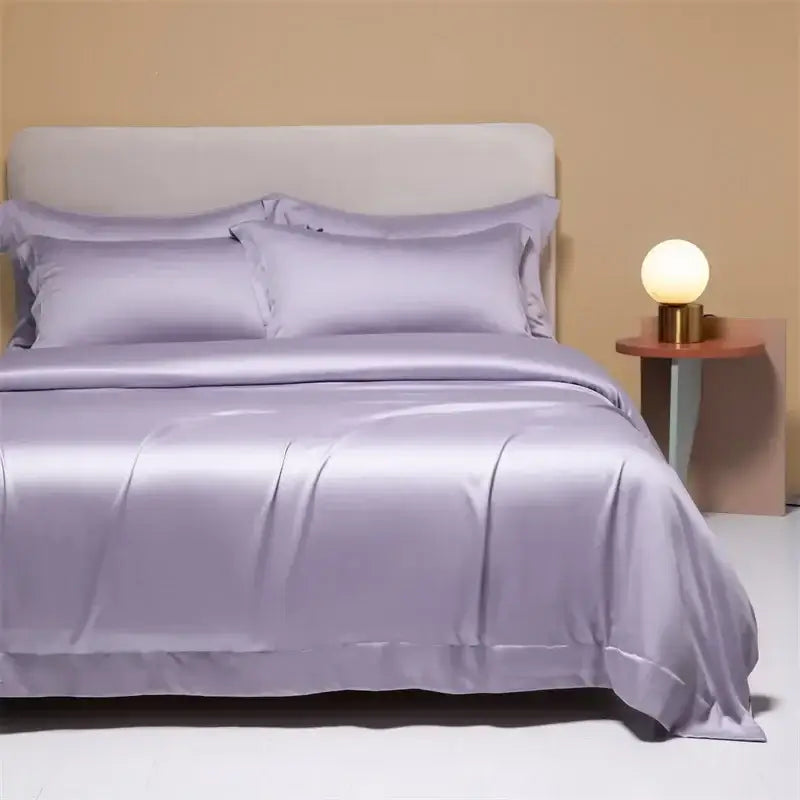 Lavender satin bedding set with matching pillows complementing peach satin cooling cotton solid bedding set for bedroom