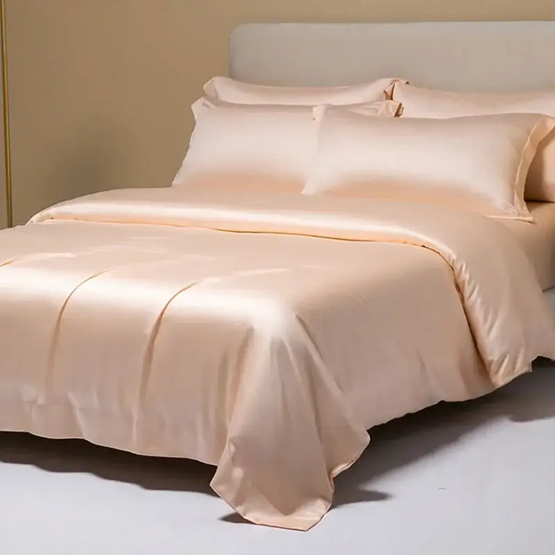 Peach satin cooling cotton solid bedding set with a luxurious satin duvet and elegant pillowcases for bedroom use