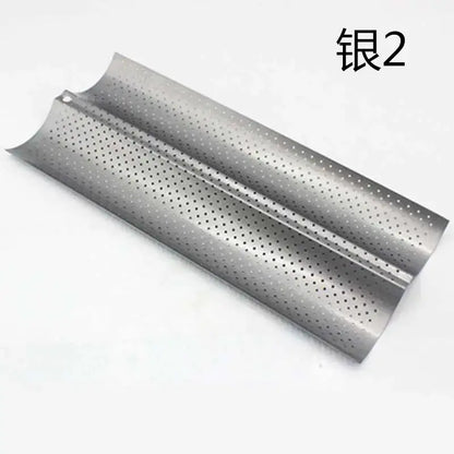 Silver-colored perforated metal wave bread pan with sleek curved design for non-stick baking use
