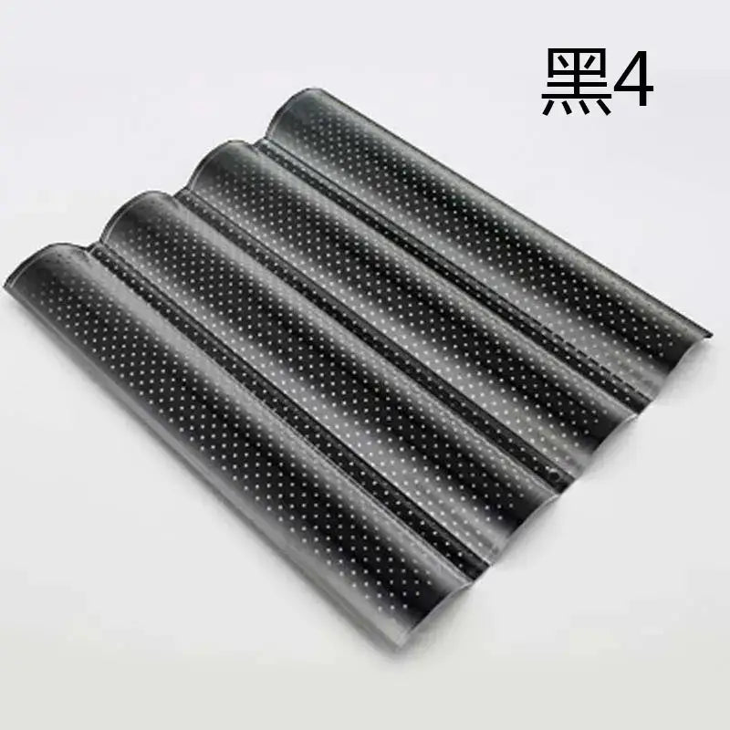 Black glossy plastic wave bread pan with perforated design and evenly spaced white dots for non-stick baking