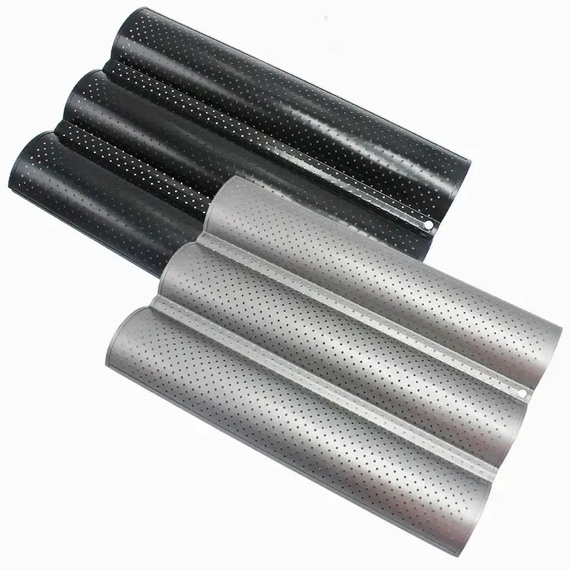 Set of black and silver perforated metal wave bread pans with non-stick coating for baking bread with modern design