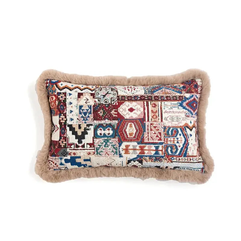 Rectangular decorbites bohemian chenille pillow cover in red and blue with geometric patchwork and tan faux fur border