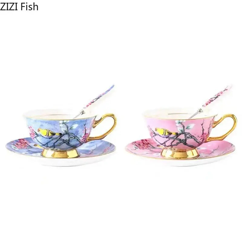 Two porcelain tea sets in lavender and pink with gold trim featuring cartoon bird pattern on ceramic cups and saucers