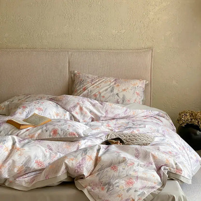 Pink and cream floral egyptian cotton print bedding set with delicate pink and lavender blossoms on a cream background