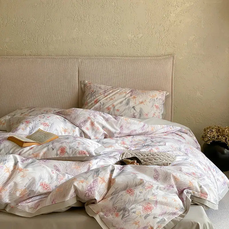 Pink and cream floral egyptian cotton print bedding set with delicate pink and lavender blossoms on a cream background