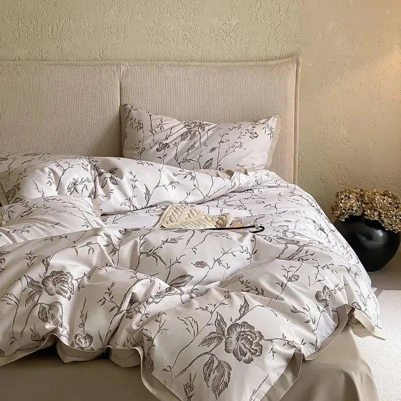 White duvet cover with gray floral embroidery and matching pillowcases in egyptian cotton print bedding set