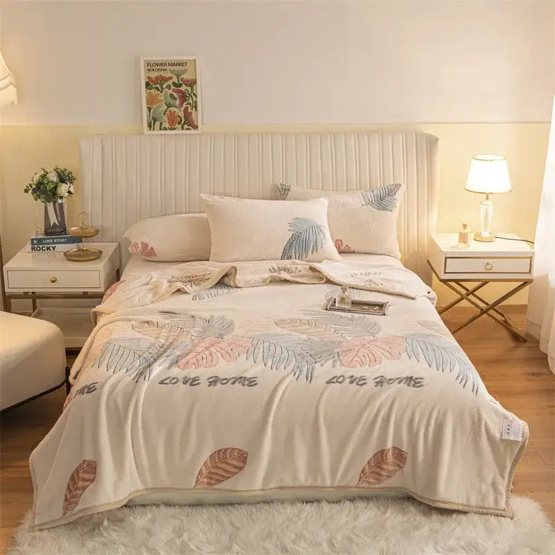 Beige fleece blanket with plush tropical leaf pattern and love home embroidery double sided plaid fleece design