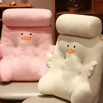 Pink and white plush dumb duck square back cushion with embroidered beak and button details for bedroom use