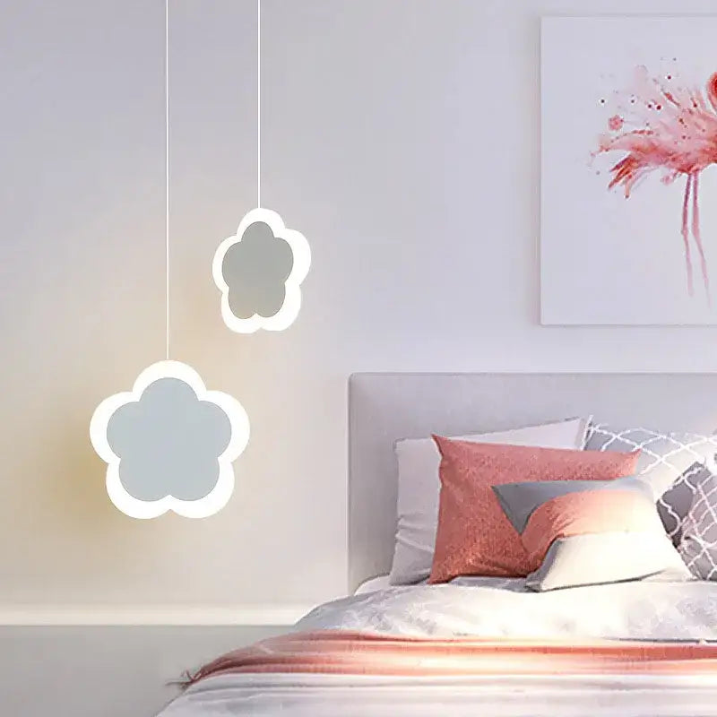 Two hanging cloud-shaped led pendant lights with soft white glow in pink and gray heart blossom butterfly chandelier design