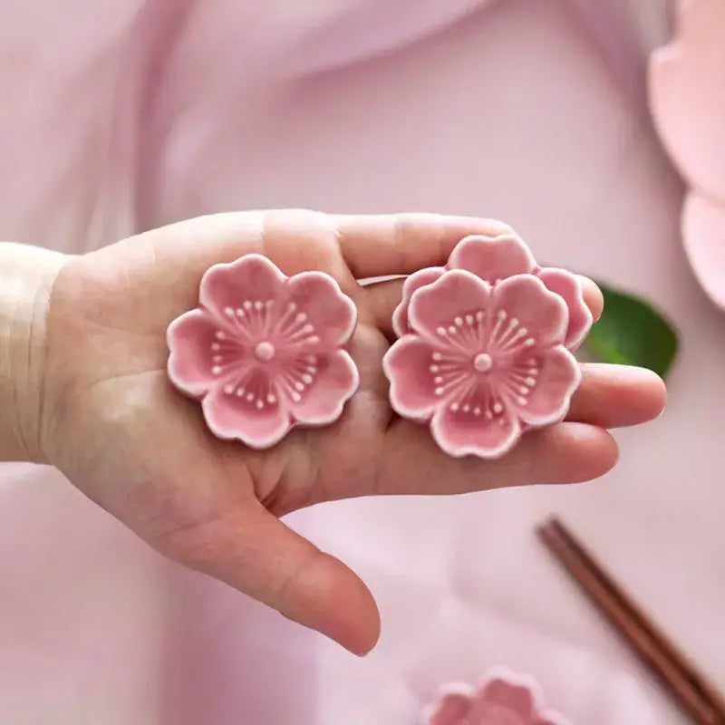 Pink and green decorbites ceramic sakura chopstick rest shaped like cherry blossoms for dining room decor