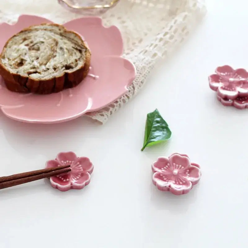 Pink and green decorbites ceramic sakura chopstick rest shaped like cherry blossom for dining room decor