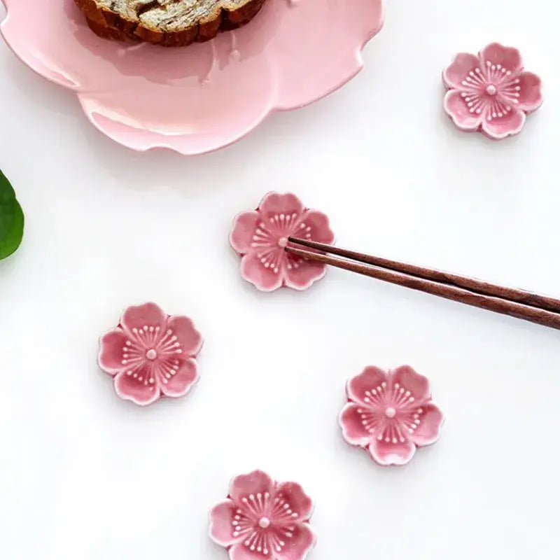 Pink and green decorbites ceramic sakura chopstick rest shaped like cherry blossom for dining room decor