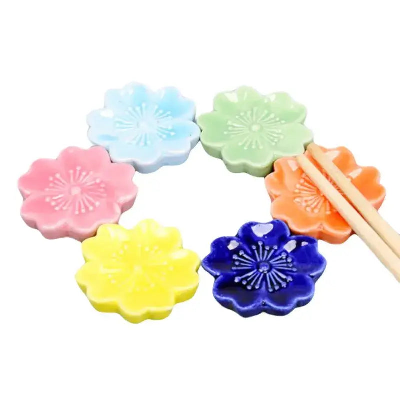 A set of pastel pink green and multicolor decorbites ceramic sakura chopstick rest for dining room decor use