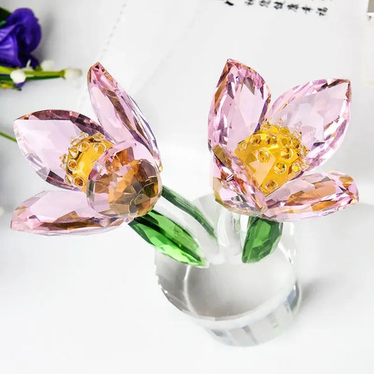 A pair of pink and green crystal tulip lily flower sculptures with golden centers in a clear glass vase for decorbites decor