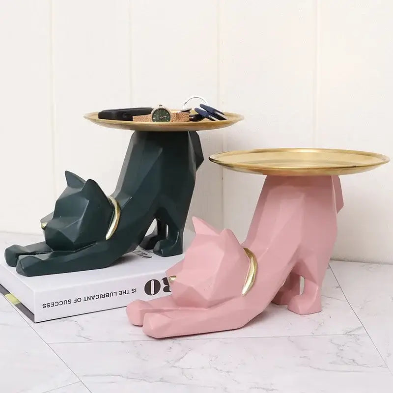 Two geometric cat storage trays in matte dark green and soft pink with gold circular plates for hallway use