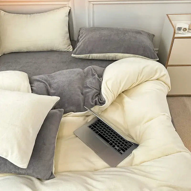 Cream-colored plush milk velvet comforter with soft texture and matching gray pillowcases velvet bedding sets