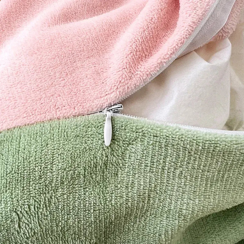 A soft plush milk velvet bedding set in pastel pink and mint green with a split design for winter comfort