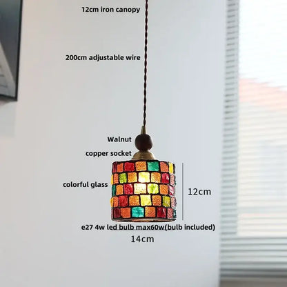 A vibrant 12cm pink and lavender decorbites glass ball led pendant light with mosaic panels and walnut-finished copper socket