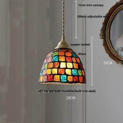 A vibrant dome-shaped decorbites glass ball led pendant light with colorful mosaic panels for kitchen decor