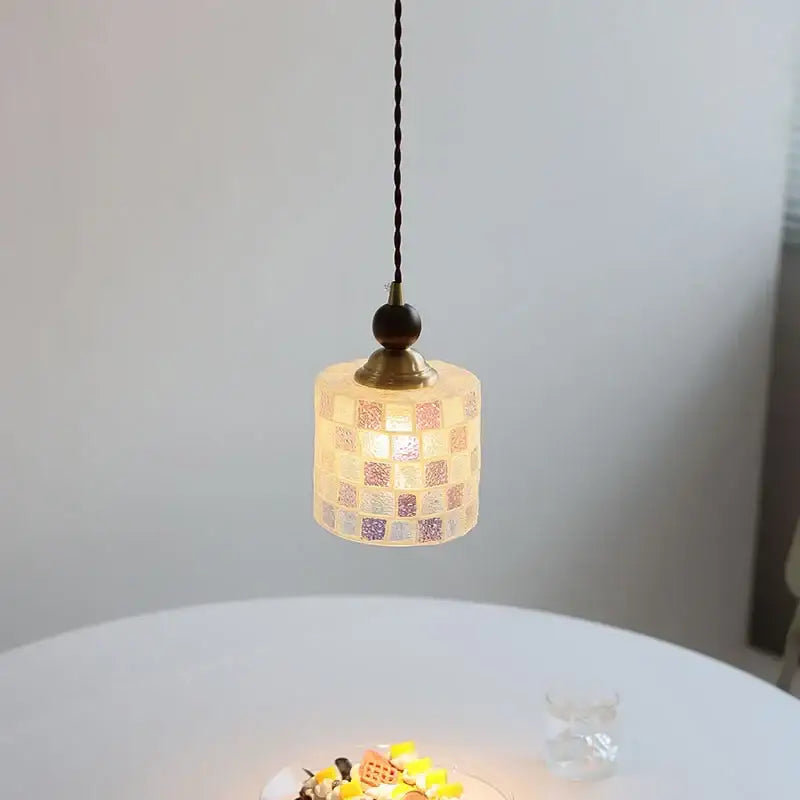 A warm-toned pendant light with pink and lavender mosaic glass ball led shade by decorbites glass ball