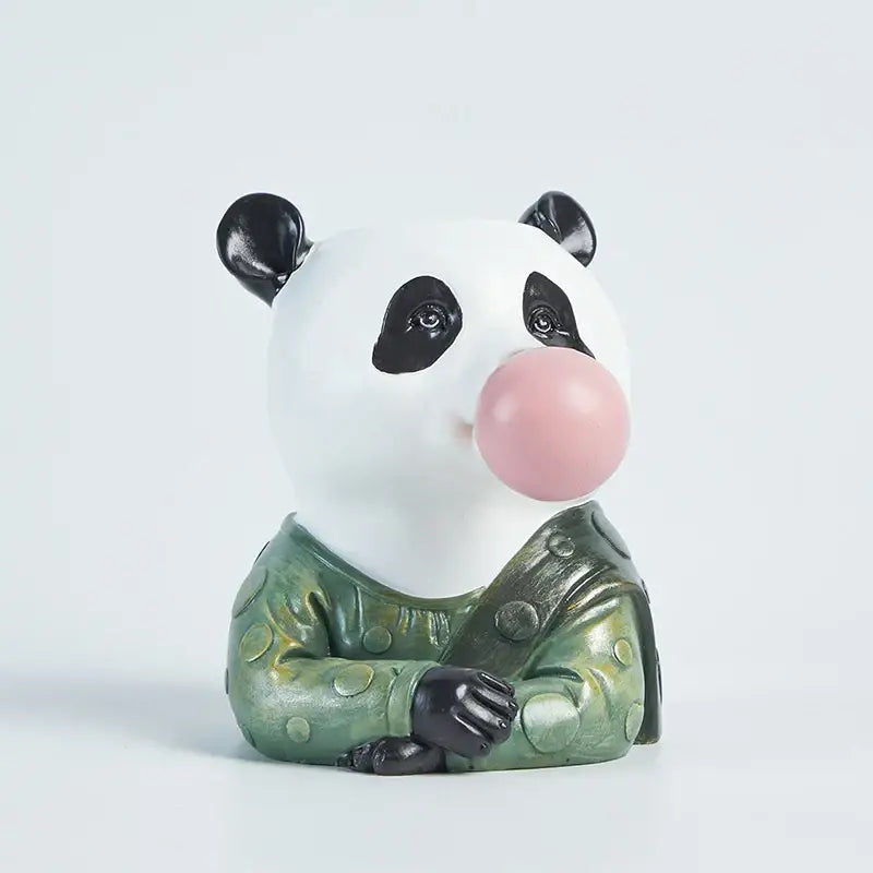 A white and black panda figurine bubble gum girl wearing a green jacket as a decorbites bubble gum flower vase decor