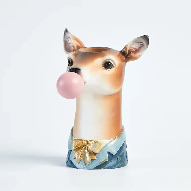 A charming resin flower vase decorbites bubble gum girl figurine with pink gum, blue denim pants, and gold bow tie