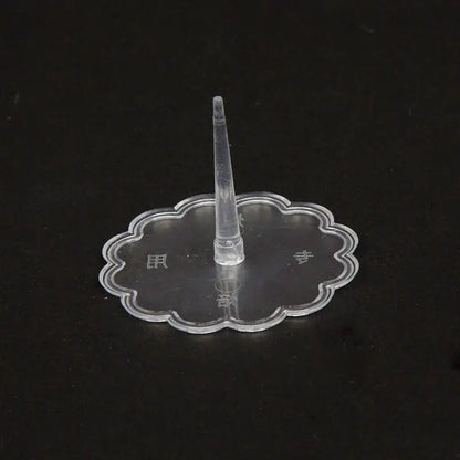 Clear plastic decorbites cake stands with scalloped base and central spike for pink and purple doll cake stands decoration