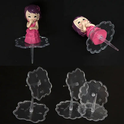 Pink and purple plastic doll cake stands decoration with purple hair on clear acrylic stand by decorbites cake stands