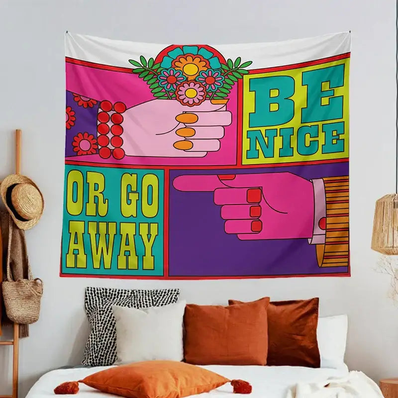 Pink and purple psychedelic hippie tapestry with bold hands and flowers displaying be nice or go away phrase wall hanging