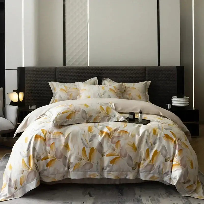 Elegant cream-colored cotton bedding set with yellow and gray leaf pattern made of soft satin-like egyptian cotton
