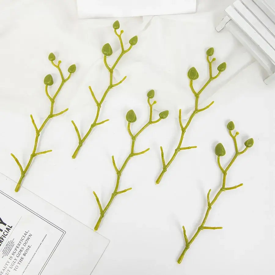 Green plastic artificial flower stems with small rounded buds for pink and white wedding garden arch decor