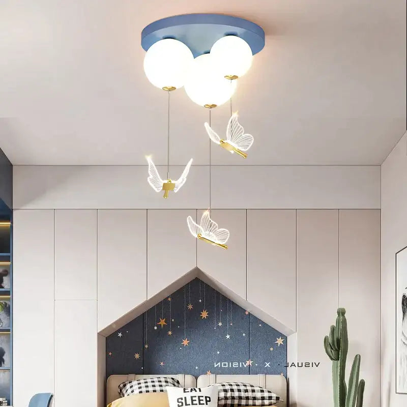Blue circular butterfly ball ceiling lamp with three white globe bulbs and hanging translucent butterfly ornaments for decorbites butterfly ball decor