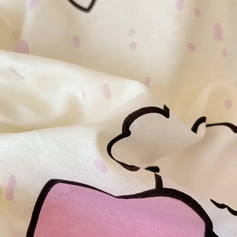 A soft cream-colored cartoon printed cotton quilt cover featuring decorbites cartoon printed pink and white accents
