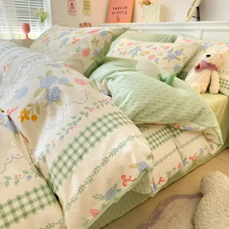 Pastel green and cream floral quilt cover with checkered accents in decorbites cartoon printed cotton bedding set