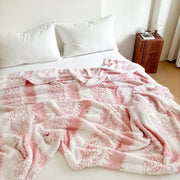 Pink and white decorbites cationic jacquard blanket with textured plush throw for bedroom decor and comfort