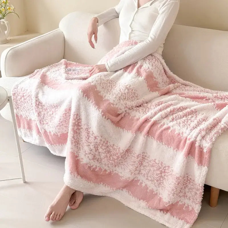 Pink and white cationic jacquard blanket with textured plush throw surface ideal for cozy bedroom decorbites cationic jacquard