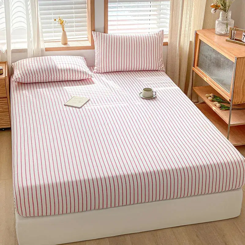 Pink and white cotton stripe fitted sheet with snug fit from decorbites for bedroom mattress cover use