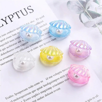 Pink and white mermaid colorful plated seashells with translucent shell-shaped charms and embedded pearls decorbites colorful plated