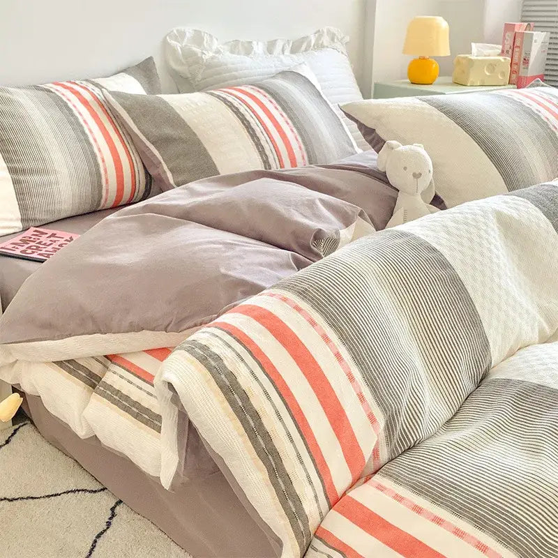 Cozy gray and coral-striped bedding set with soft textured fabric in decorbites cotton jacquard cotton jacquard bedding