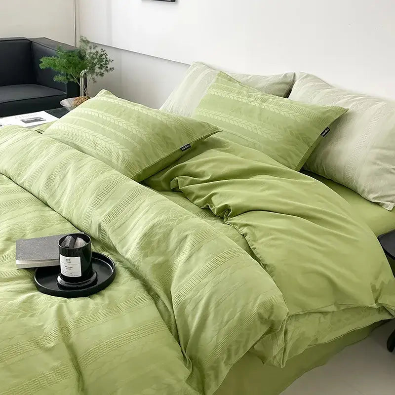 Soft sage green cotton jacquard bedding set with subtle woven texture and matching pillowcases for decorbites bedroom decor