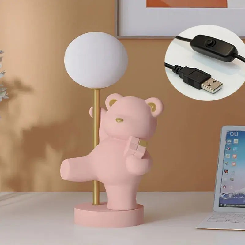 Pink bear princess desk night light featuring a gold pole and white spherical led desk night light fixture