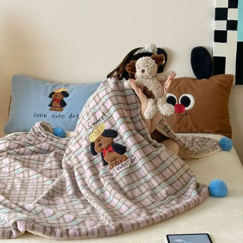 Soft pink and beige plaid cartoon patch woolen blanket with fur balls featuring a brown puppy in yellow hat decorbites cartoon patch