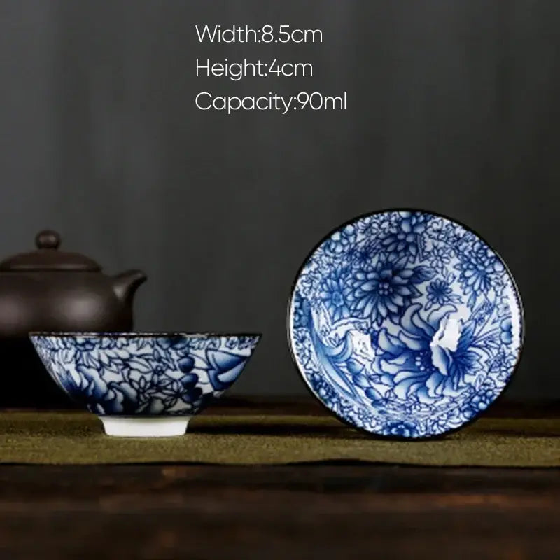 Blue and white porcelain hand-painted tea bowl with intricate floral patterns from decorbites dining room set
