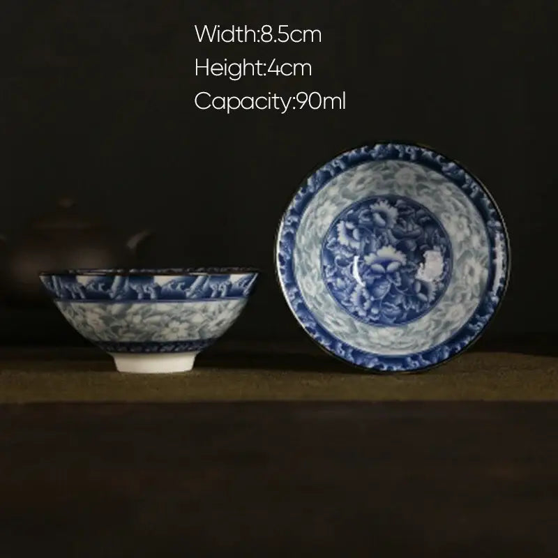 Decorbites blue and white porcelain hand-painted tea bowl with intricate floral patterns and a glossy finish