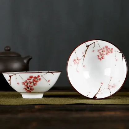 White porcelain hand-painted bowls with pink and black floral cherry blossom patterns and glossy finish from decorbites blue