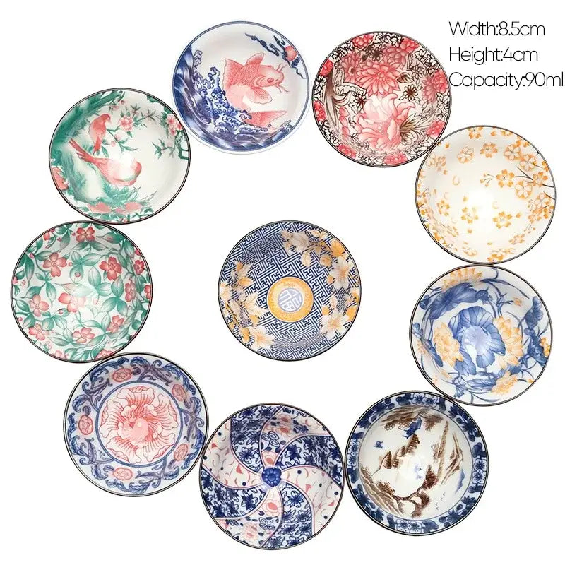 A pink and black floral white porcelain hand-painted bowl set featuring decorbites blue and traditional east asian motifs