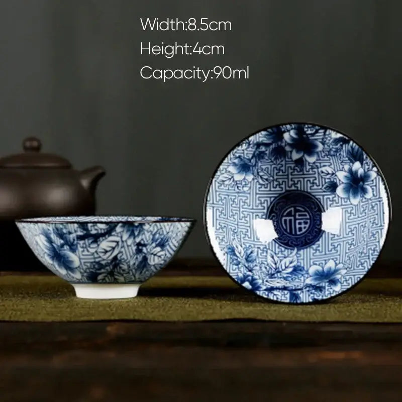 Blue and white porcelain hand-painted tea bowl with floral geometric patterns and chinese characters for decorbites white porcelain set