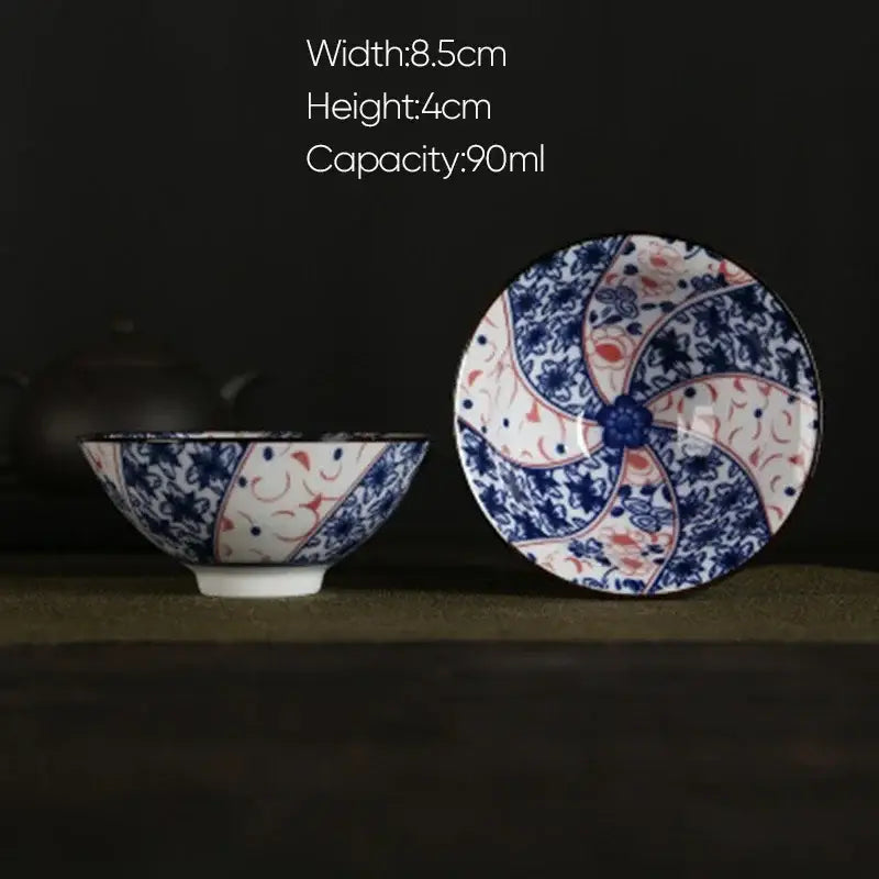A delicate blue white porcelain hand-painted bowl and saucer with intricate floral patterns from decorbites