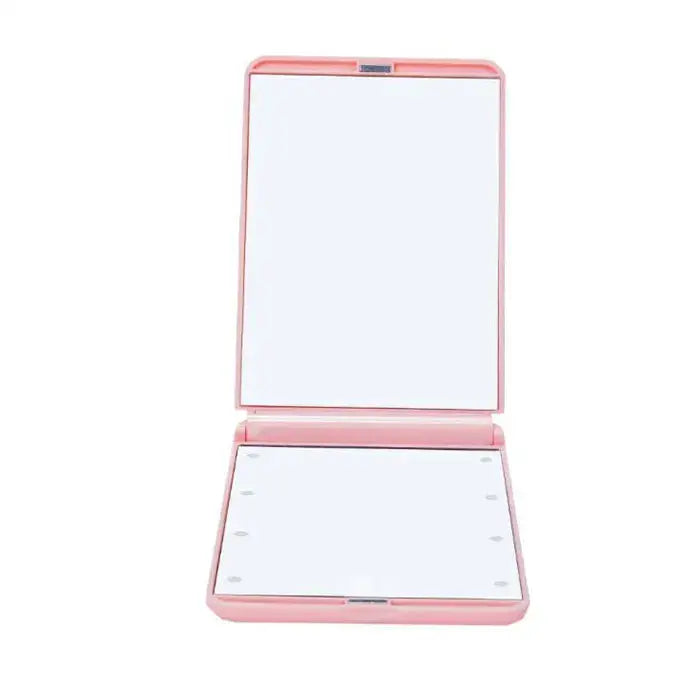 Pink and black led vanity mirror compact with sleek rectangular design and illuminated surface for bedroom makeup use