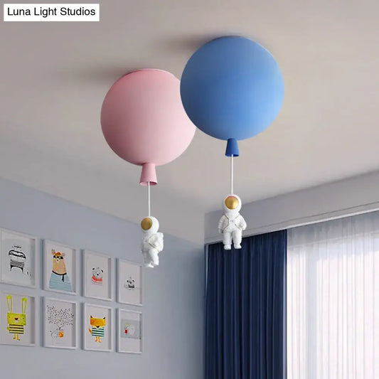 Pink and blue balloon-shaped astronaut ceiling lamp with figurines dangling designed for bedroom pendant lighting